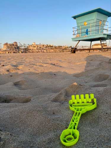 Close up view of a tool used to build sandcastle in Huntington State Beach
