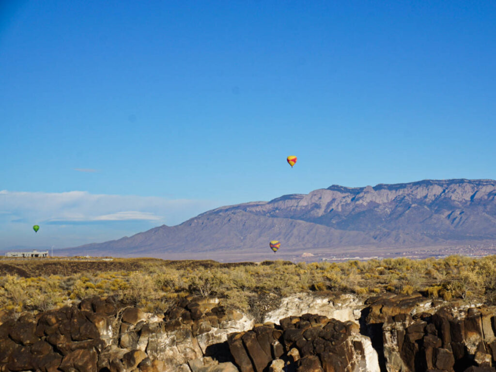 Scenic view of the hot air balloons over the Sandia Mountains