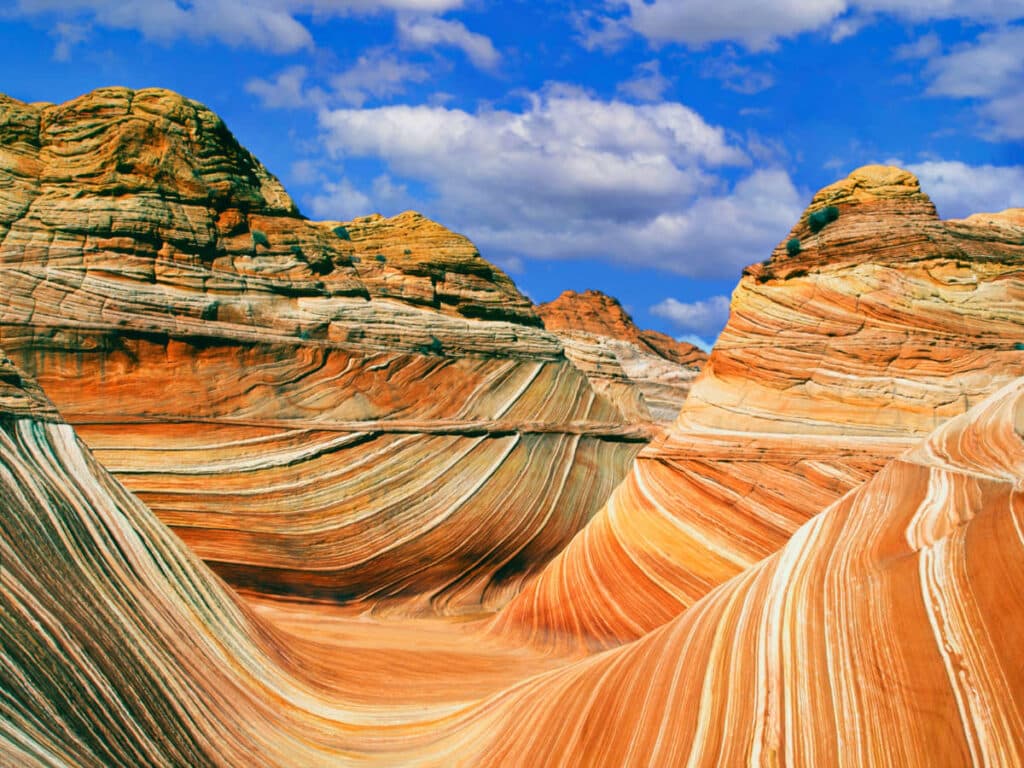 View of the beautiful sandstone layers of The Wave on a sunny day