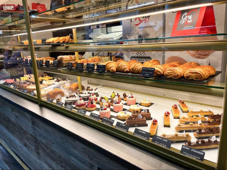 A variety of mouthwatering pastries and desserts are displayed at Santa Catalina Market