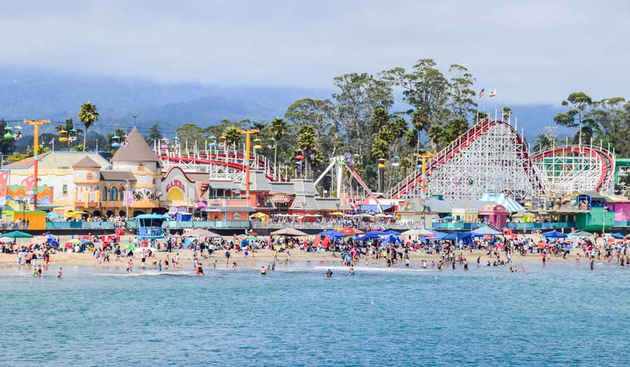 People enjoying their day in Santa Cruz Beach Boardwalk Amusement Park