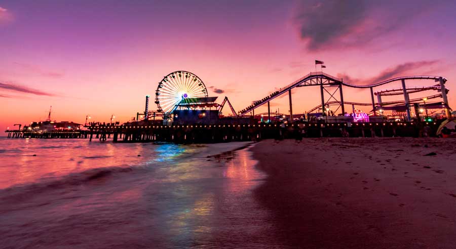 The Santa Monica Pier from afar during sunset in California