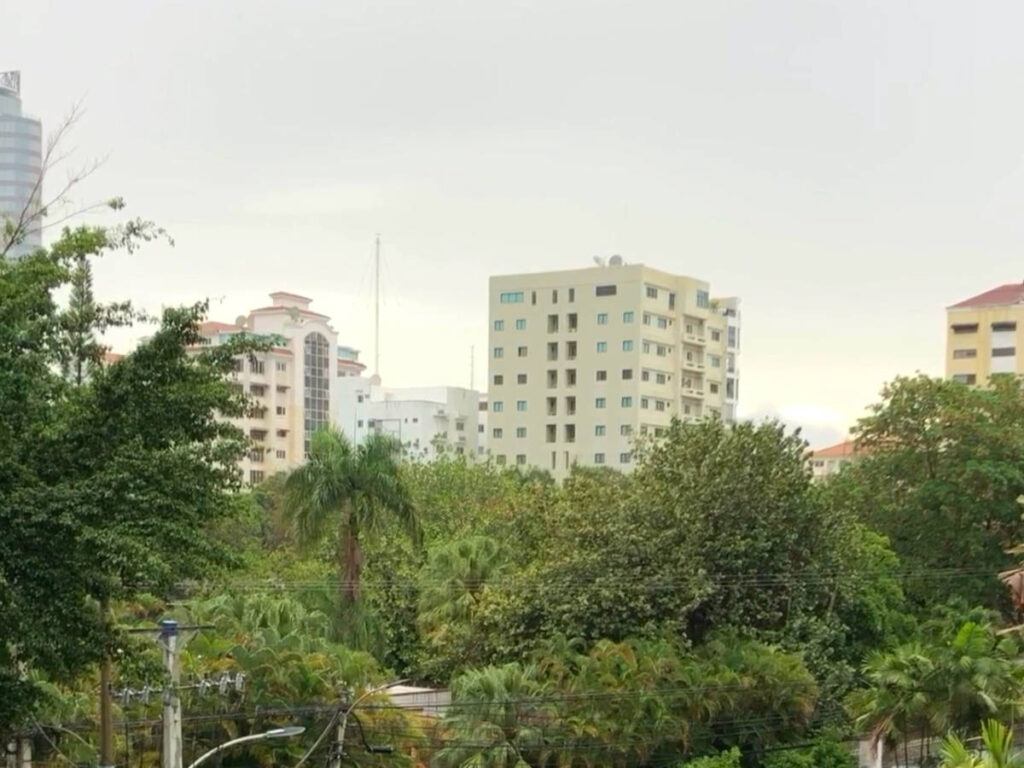 View of the city skyline of Santo Domingo surrounded by greenery