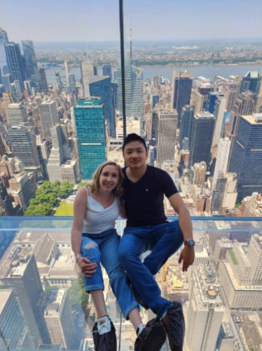 Sarah Heath with an overlooking view at the NYC Summit Observation Deck