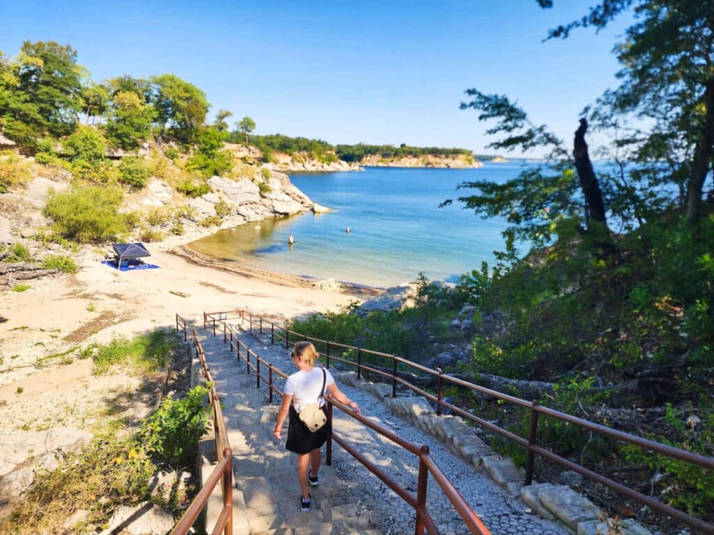 The author Sarah Heath, going down the stairs to Lake Texoma
