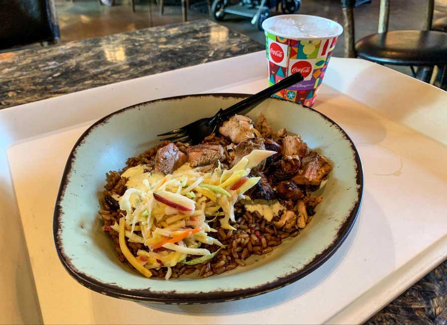 View of a wood-grilled chicken bowl on a table in Satu’li Canteen