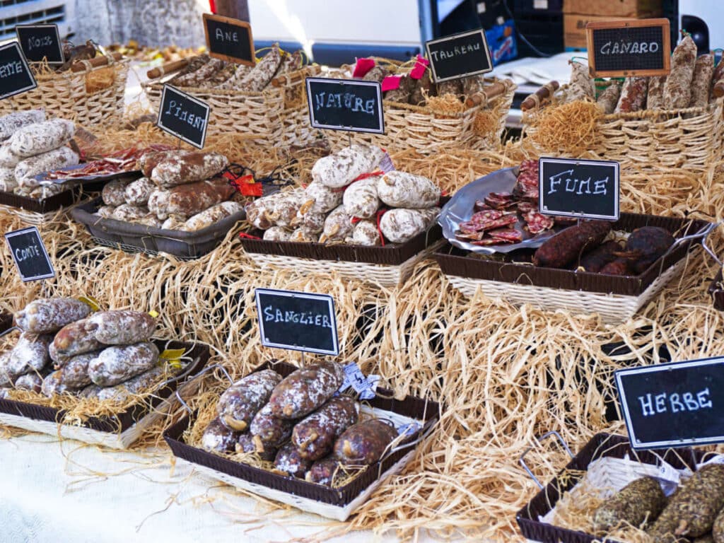 Variety of local sausages displayed at the Lyon Street Market