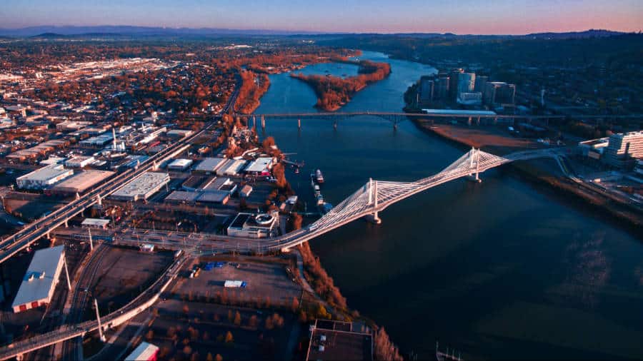Aerial view of Sauvie Island and the Tilikum Crossing Bridge at sunset