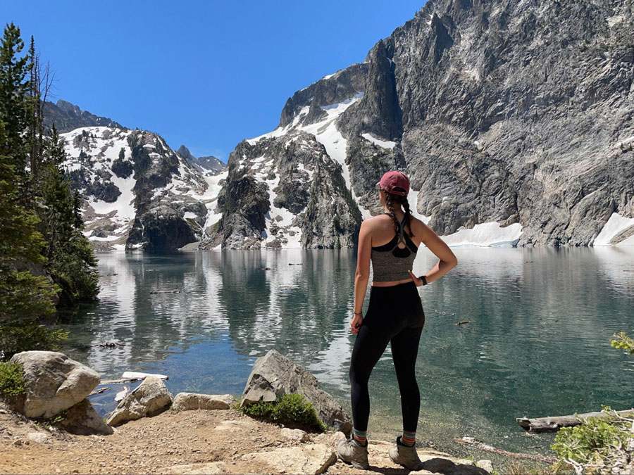 The author admiring the view during her hike in Sawtooth Range