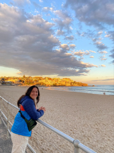 The author partner enjoying the scenic sunset view at the beach