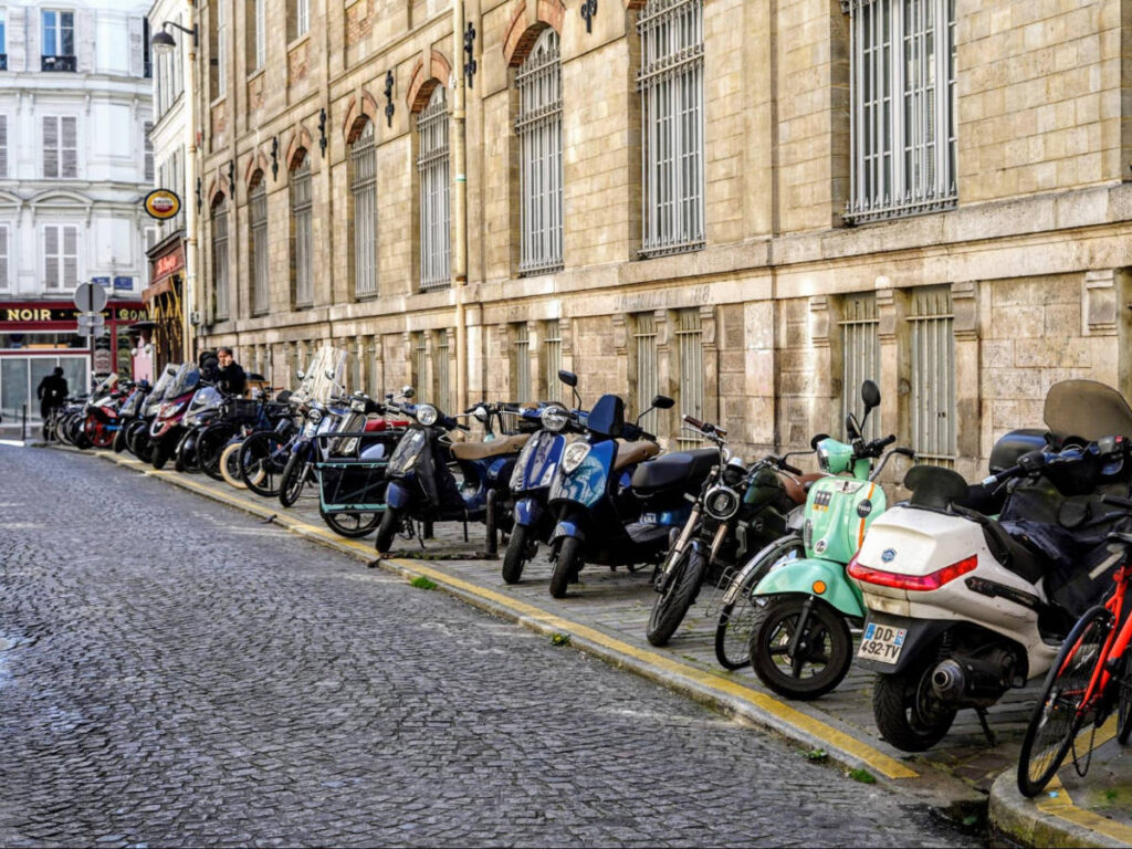 Scooters parked on a residential street in Montmartre