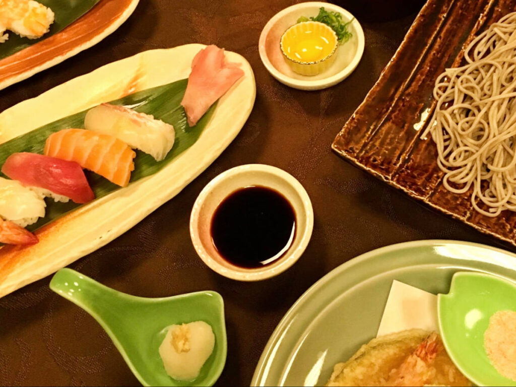 Different kinds of seafood dishes on a table