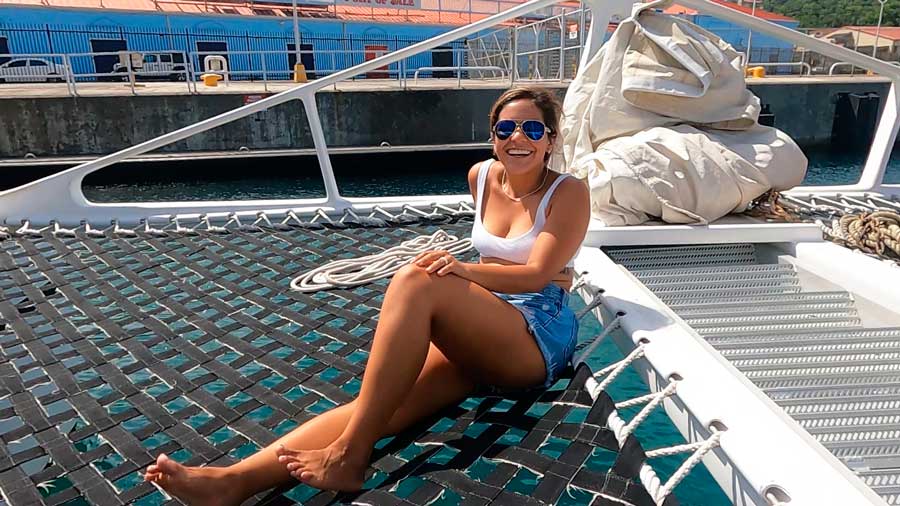 The author's wife posing for a photo during their private Catamaran cruise