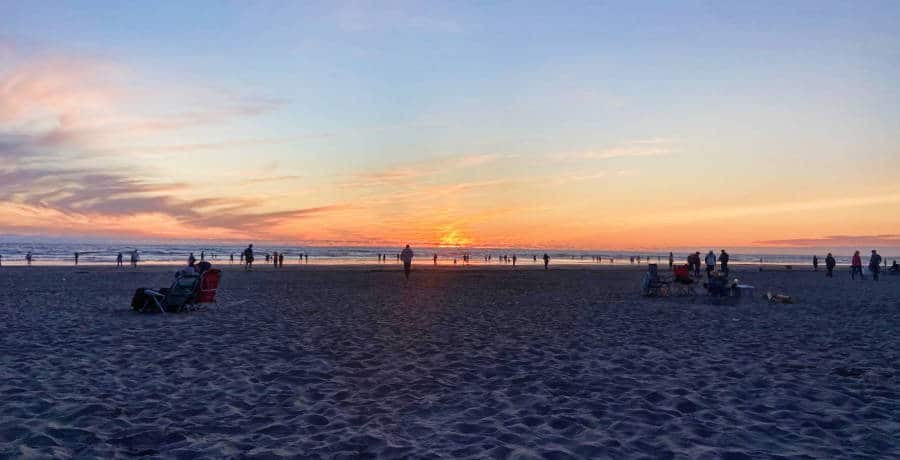 View of people at the Seaside during sunset