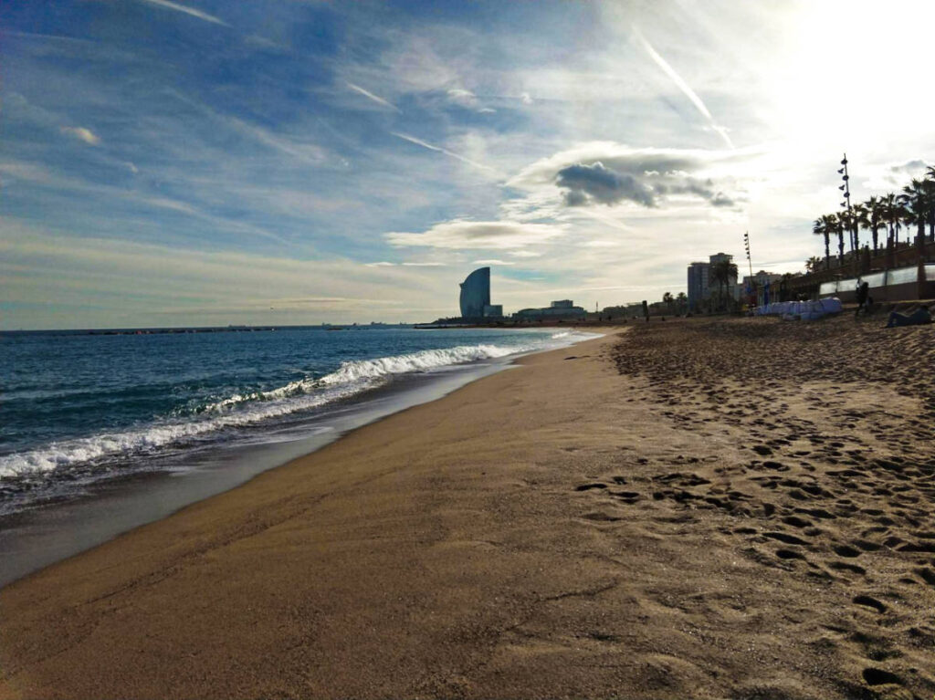 A peaceful seaside with skyline view in Barcelona