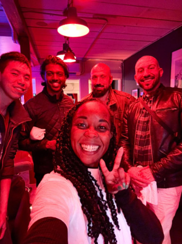 People smiling for a photo during the Travel Lemming's Seattle Community Meetups