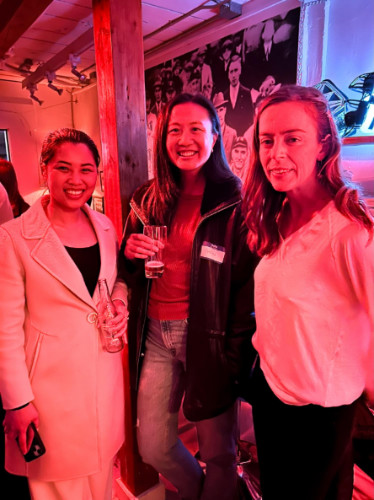 People smiling for a photo during the Travel Lemming's Seattle Community Meetups