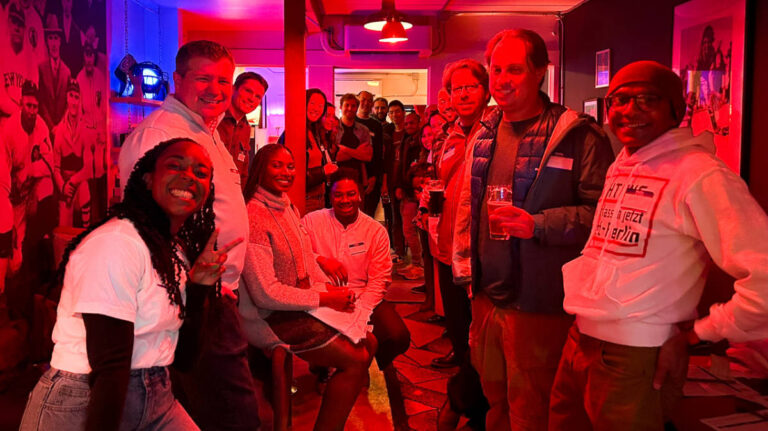 People smiling for a photo during the Travel Lemming's Seattle Community Meetups