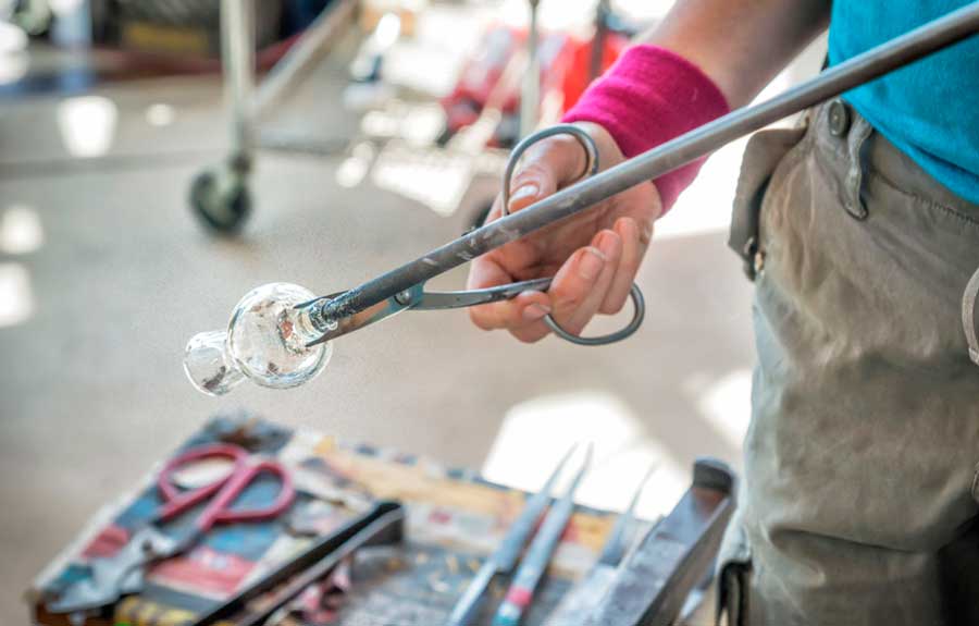 A man doing a glass blowing in Seattle Glassblowing
