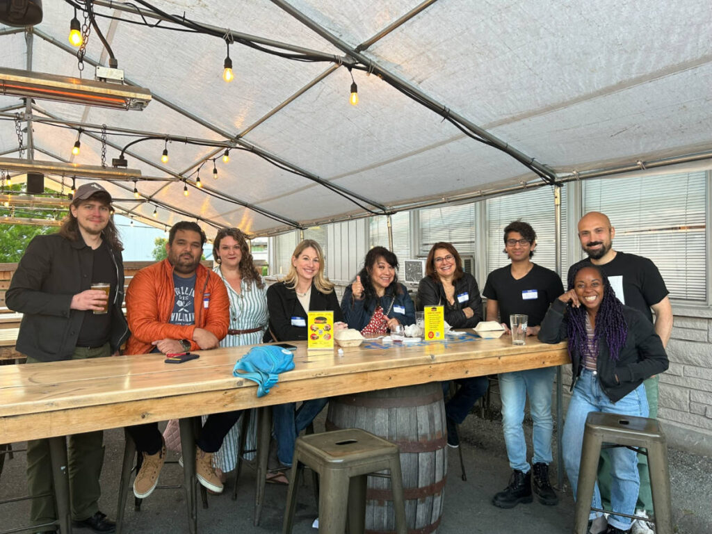 People smiling for a photo during the Travel Lemming's Seattle Community Meetups