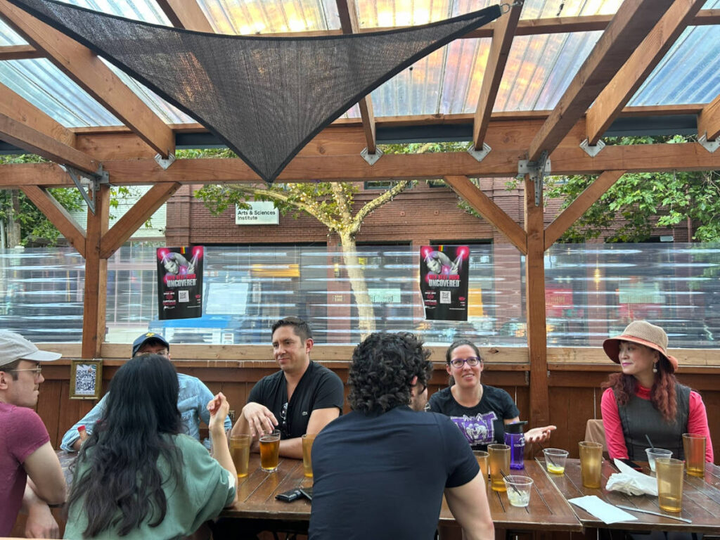 People sharing travel stories during the recent Seattle Travel Community Meetup
