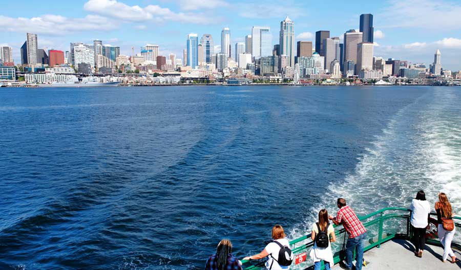 View of people admiring the view from Seattle Waterfront Pier