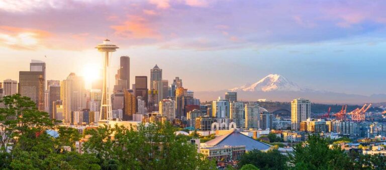 View of Seattle's Downtown skyline and the colorful sky over it during sunset