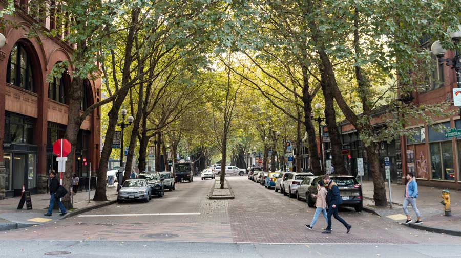 View of people crossing a street in Pioneer Square