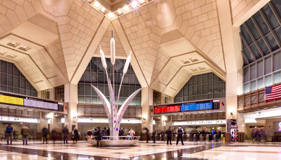 A modern interior view of the main hall of the Frank R. Lautenberg Rail Station at Secaucus Junction