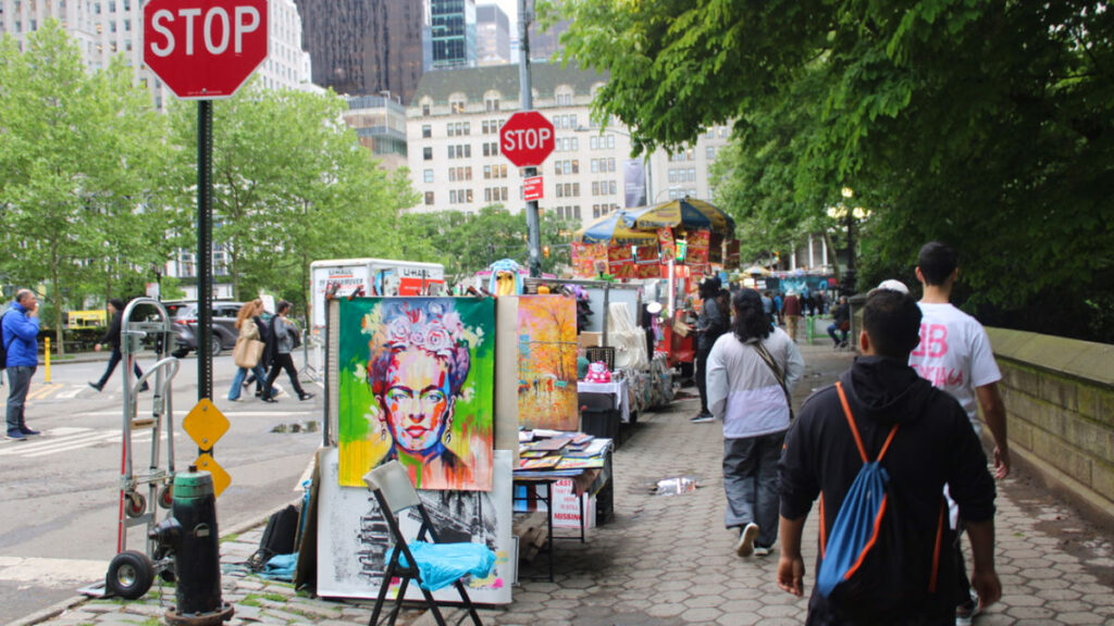 Artists selling artwork on the street near Central Park