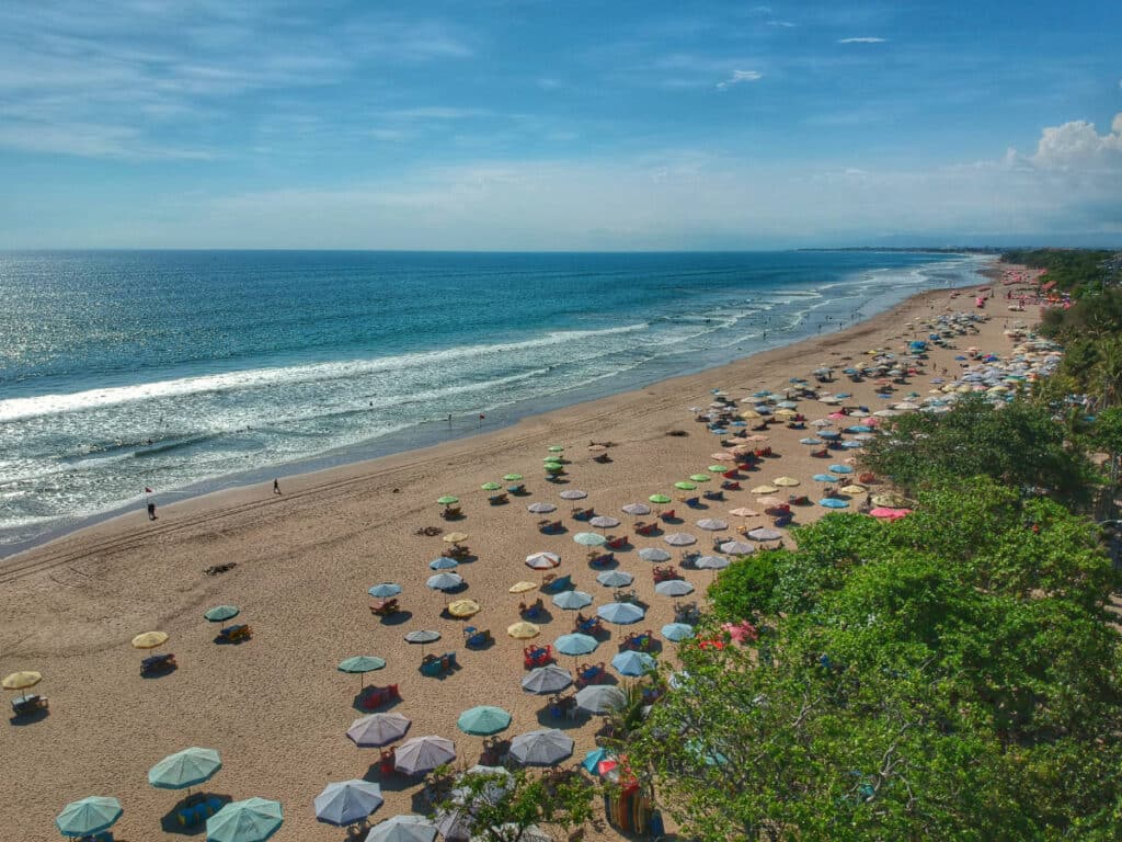 Overlooking view of beach umbrellas at the Seminyak Beach in Bali