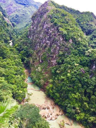 Aerial view of the scenic Semuc Champey surrounded by greenery