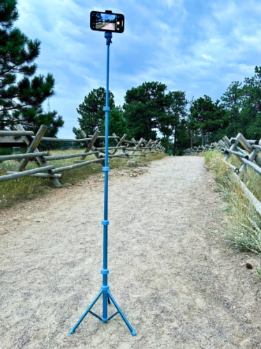 A mobile phone mounted on the Sensyne 62'' Phone Tripod & Selfie Stick