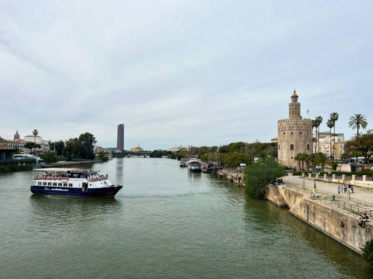 Overlooking view of a boat cruise on the river in Seville