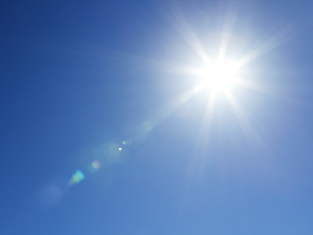 Sunlight against a clear blue sky
