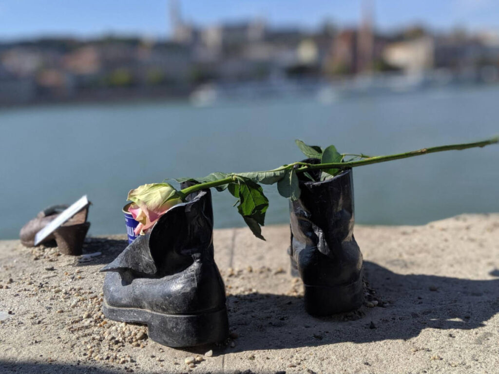 Shoes on the Danube history memorial at the river bank