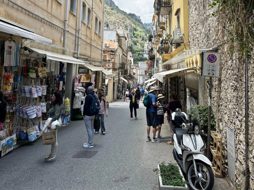 Tourists enjoying shopping at Taormina