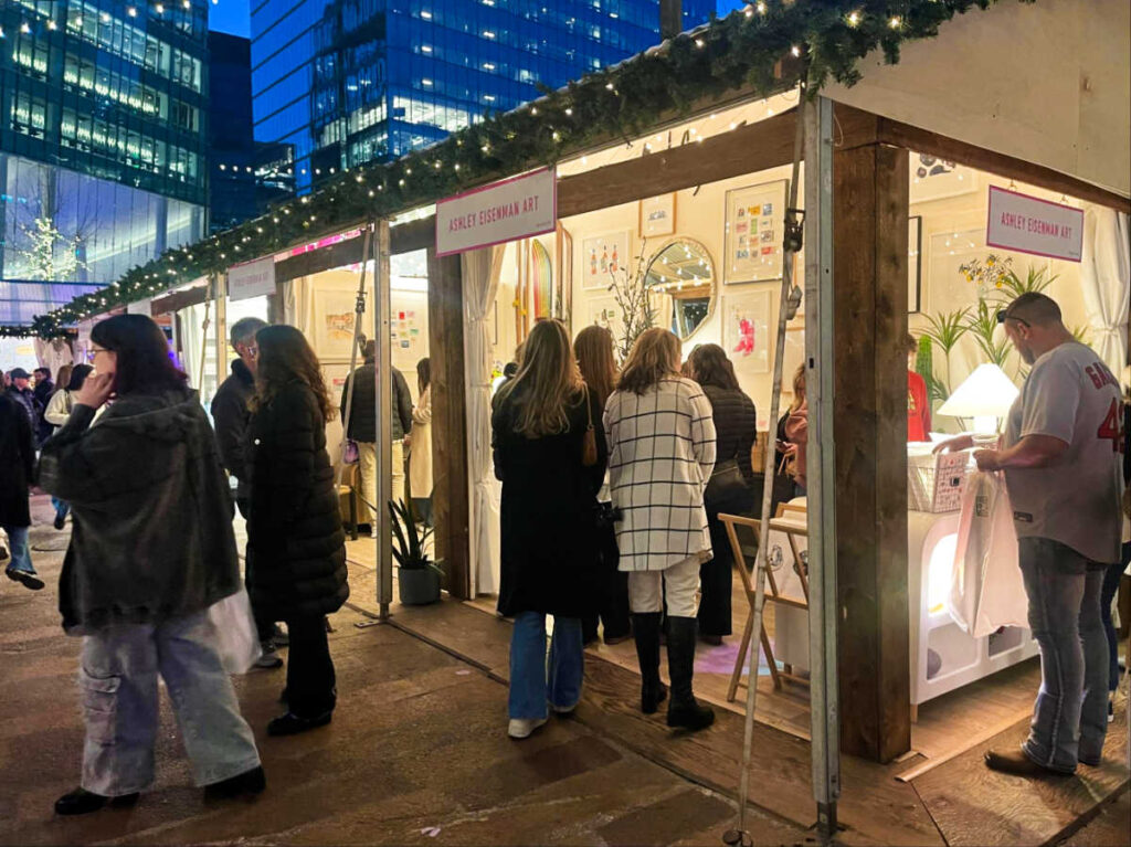 View of the shoppers and vendors around the Snowport Holiday Market