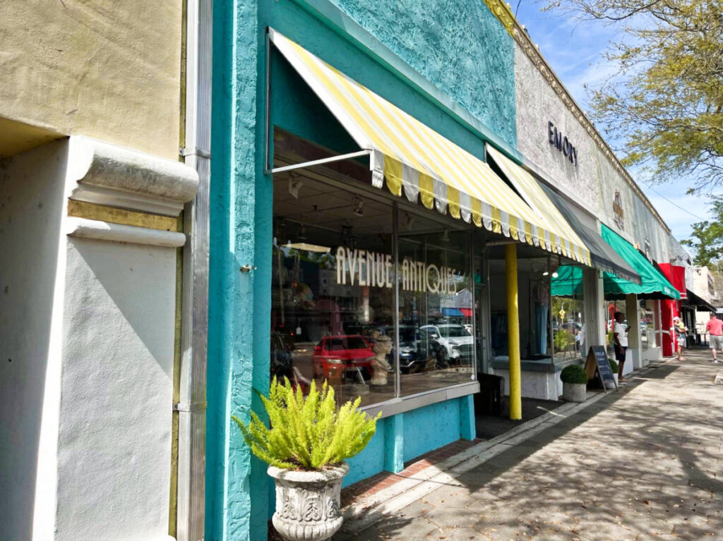 The colorful storefronts of the shops along Avondale
