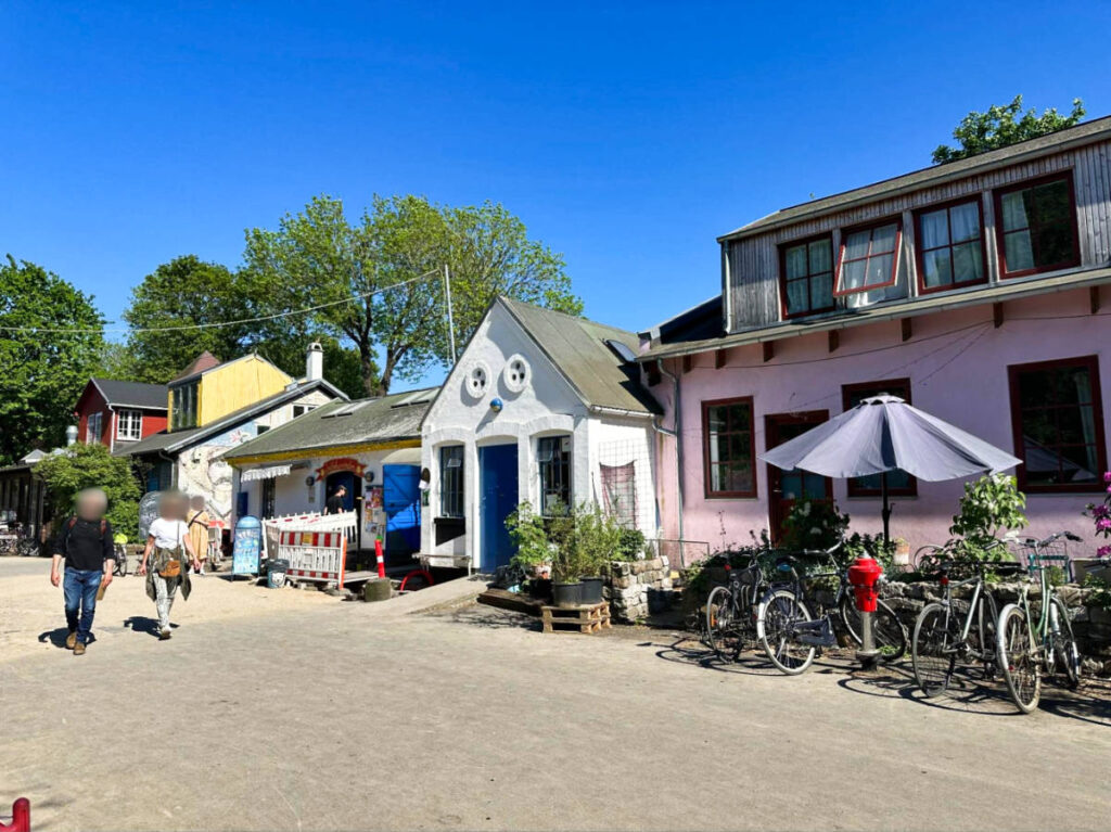 View of the shops and the people wandering around Christiania