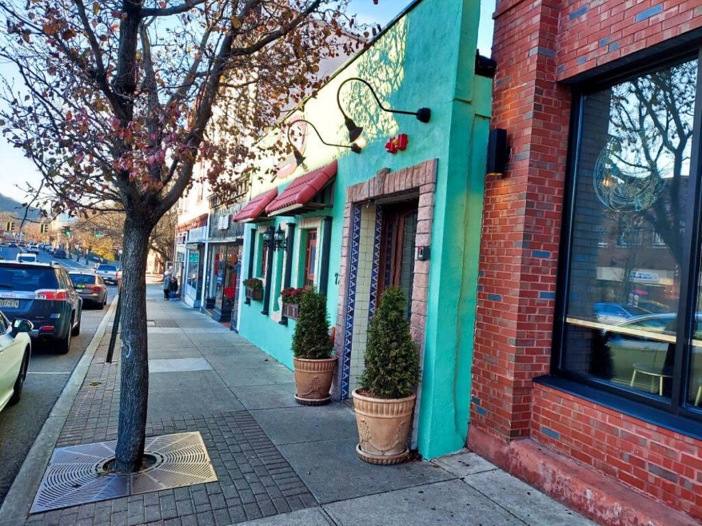 View of the colorful storefronts at Downtown Suffern