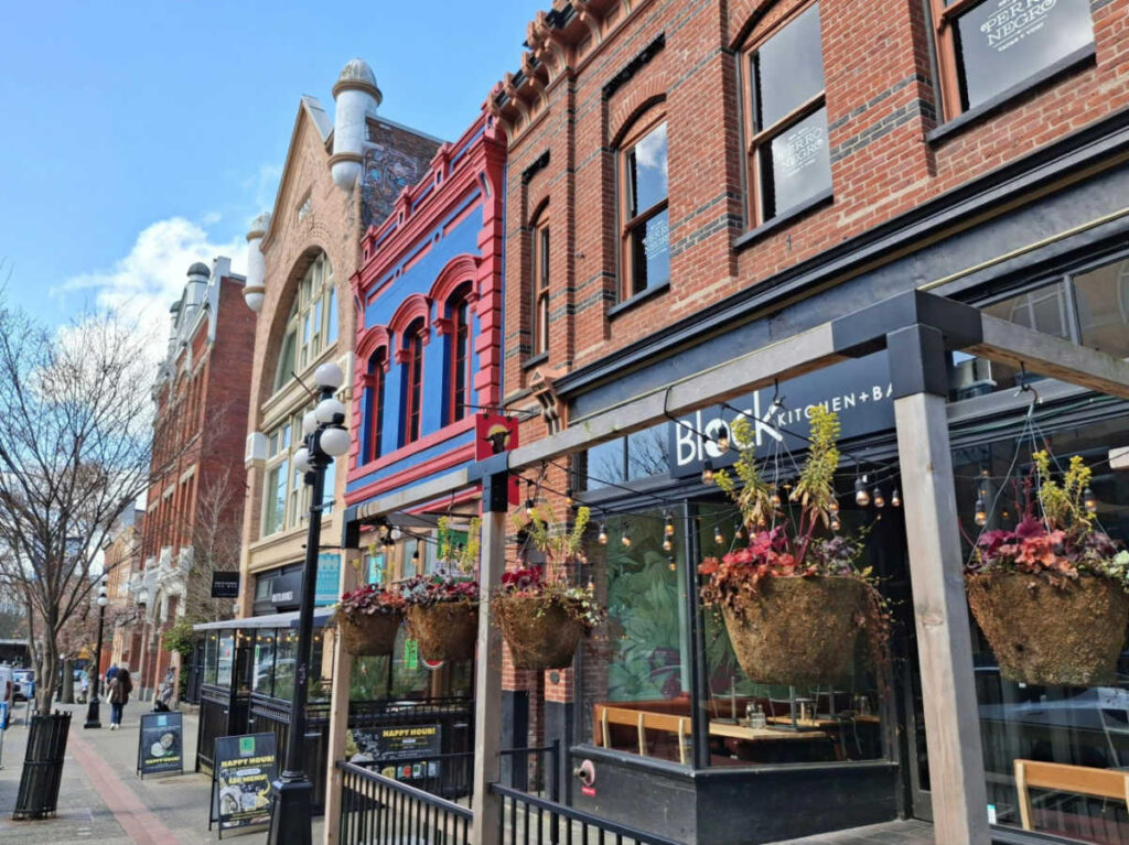 View of the brick walled exterior of the shops at Downtown Victoria