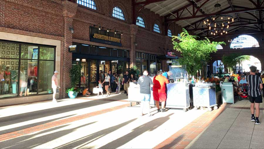 People wandering in different shops at Disney Springs