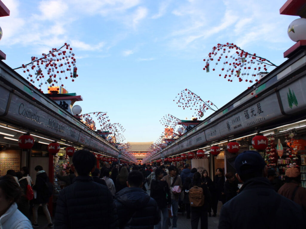 People strolling at the shops leading to Senso-Ji Temple in Tokyo