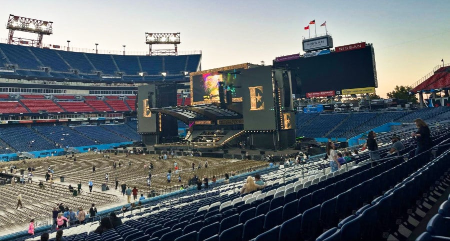 View inside the Nissan Stadium with people getting ready for an evening show