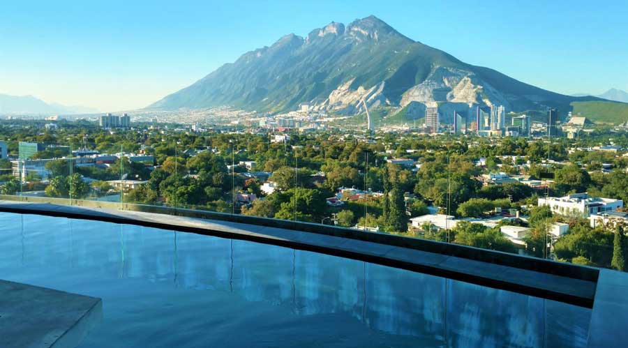 The Sierra Las Mitras from an infinity pool in Monterrey