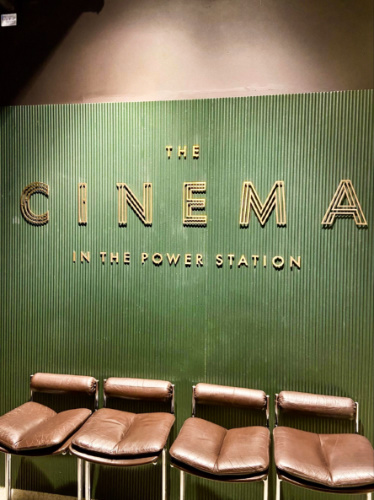 View of the seats in front of the wall signage of The Cinema in the Power Station