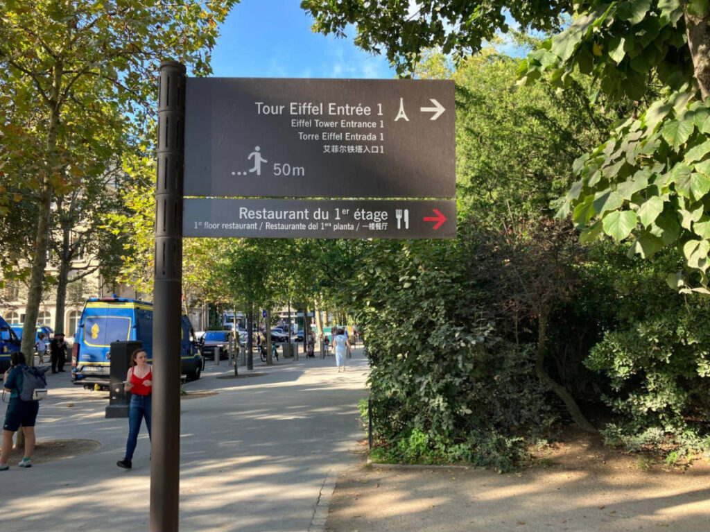 Signage in Champ de Mars that will lead you to the Eiffel Tower