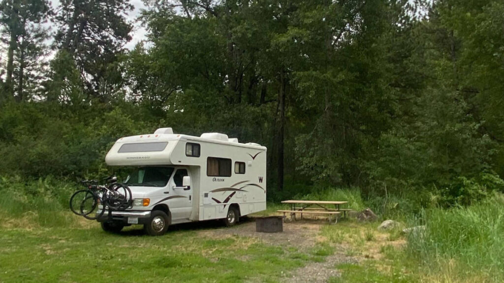 An RV parked at the Silver Falls State Park Campground