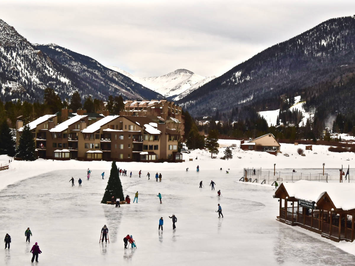 People enjoying their winter on a skating rink